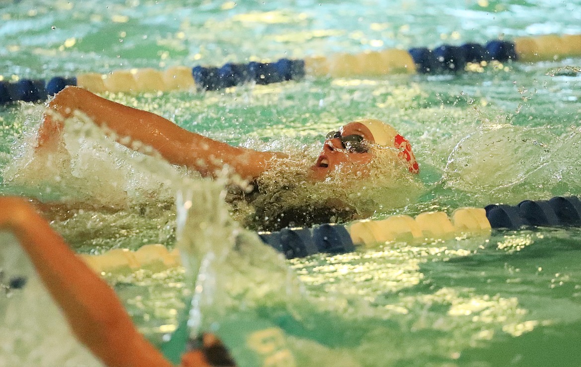 Ava de Leeuw swims the backstroke in the 200 medley relay on Friday.