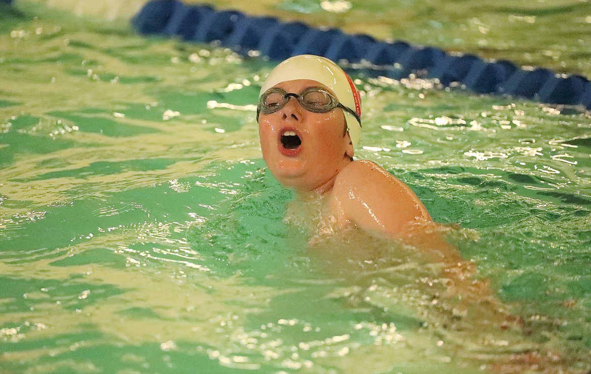 Calvin Williams competes in the 50 freestyle on Friday.