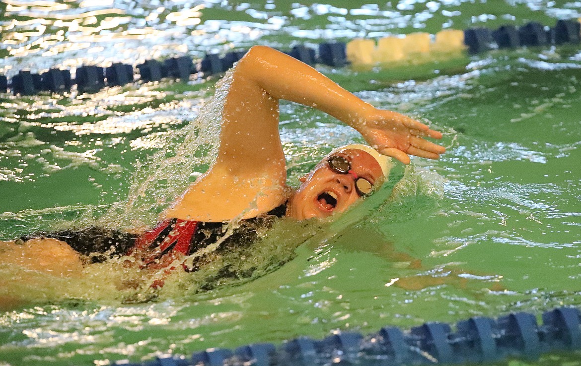 Emma Schmitt swims the freestyle in the 200 medley relay on Friday.