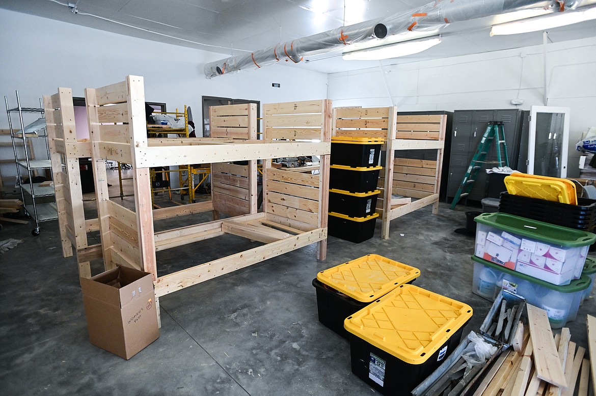 Bunk bed frames and storage tubs of supplies at the Flathead Warming Center at 889 North Meridian Road in Kalispell on Tuesday, Oct. 12. (Casey Kreider/Daily Inter Lake)