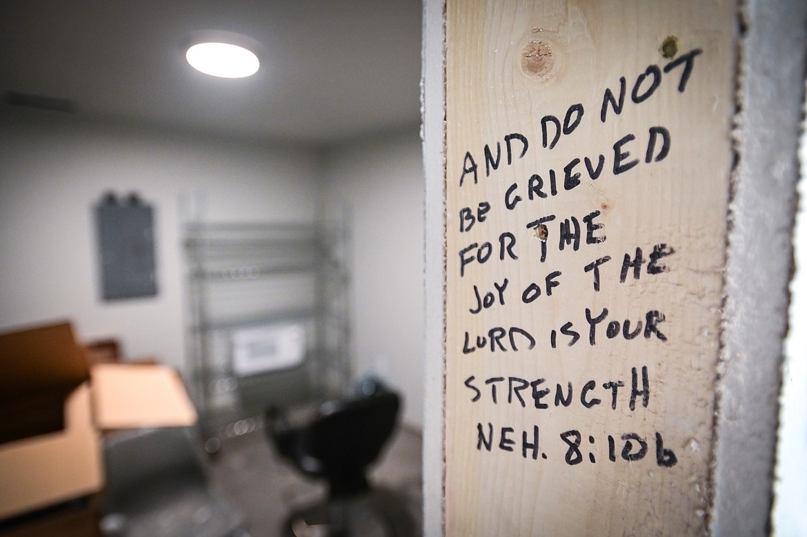 One of several Bible verses written by volunteers on the framing of the new Flathead Warming Center in Kalispell on Tuesday, Oct. 12. (Casey Kreider/Daily Inter Lake)