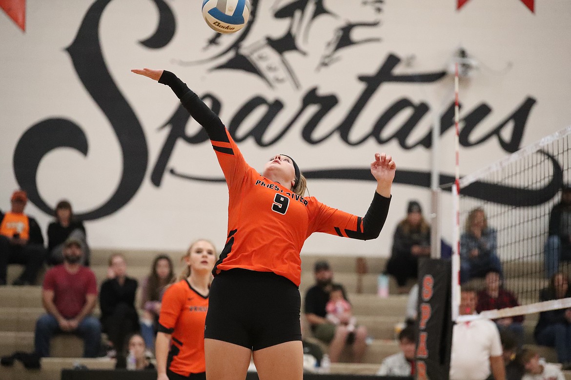 Allyson Barton attempts to tip a ball over the net last Wednesday.