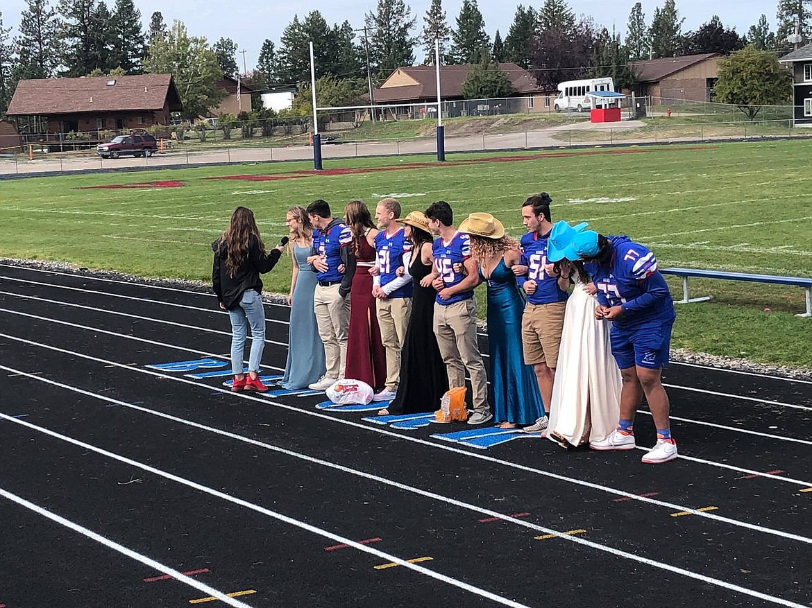 Bigfork High School's 2021 Homecoming Court answering questions during a pep rally ahead of the school's homecoming football game.