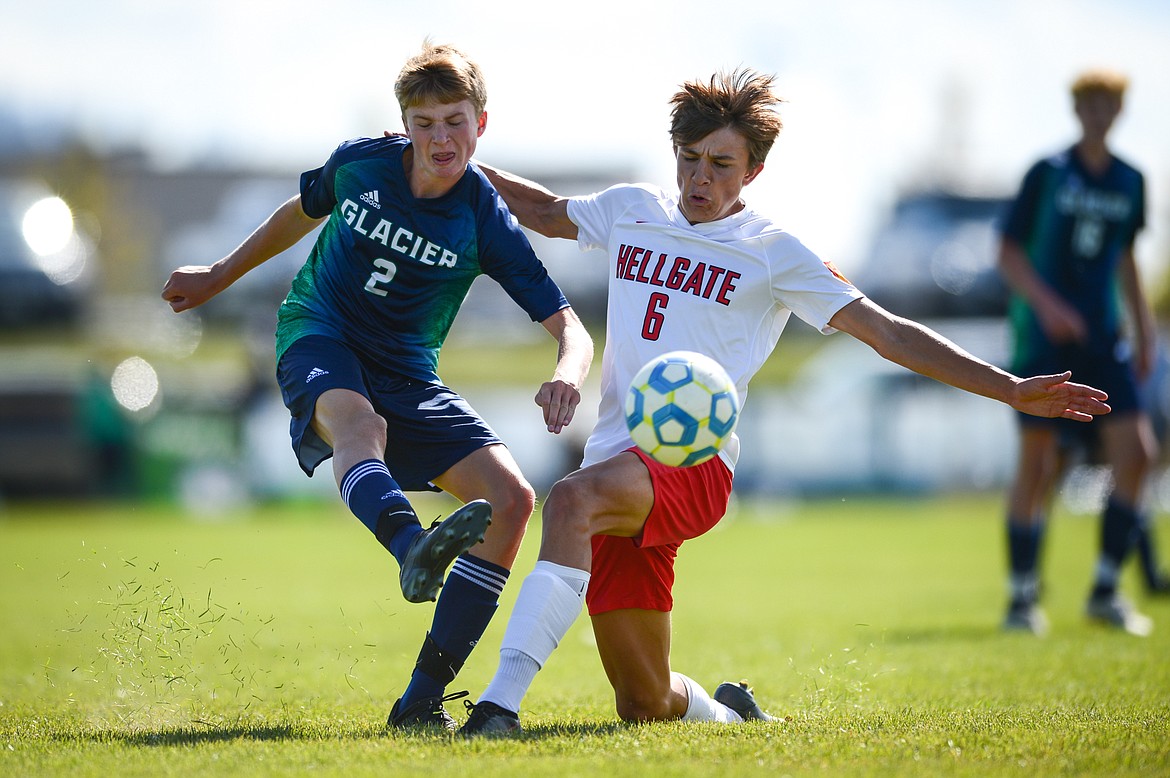 Glacier's Sam Ells (2) looks to shoot while defended by Missoula Hellgate's Henry Pierce (6) at Glacier High School on Thursday, Sept. 2. (Casey Kreider/Daily Inter Lake)