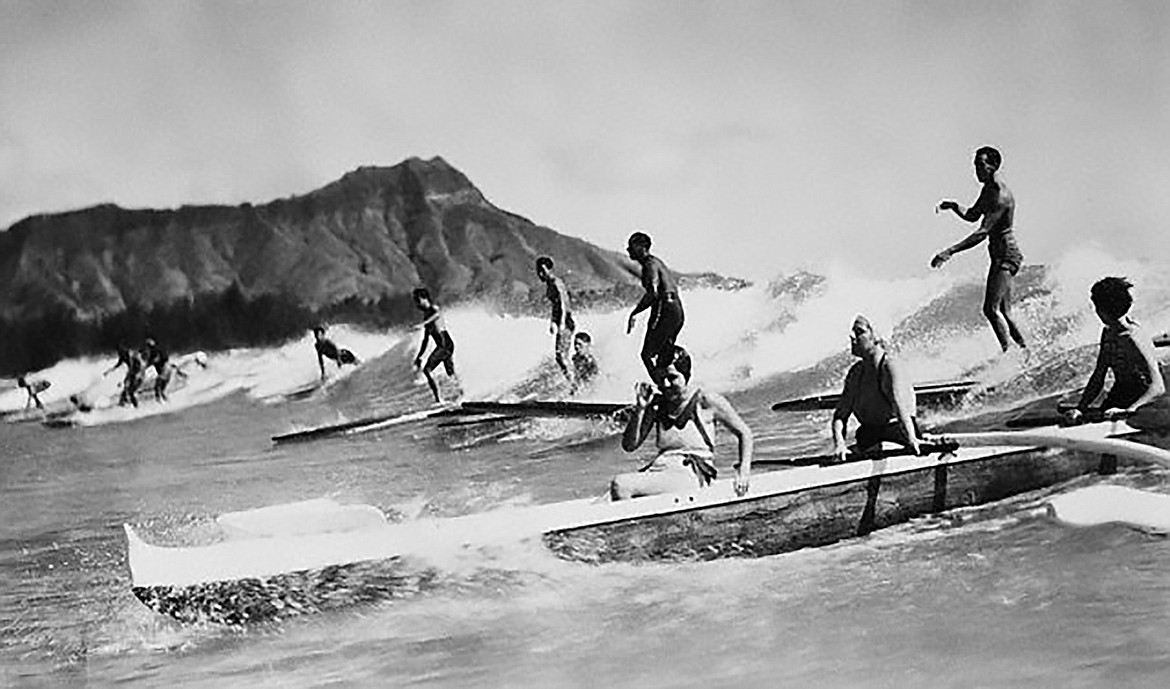 Outrigger canoe and surfing at Waikiki in the 1930s.