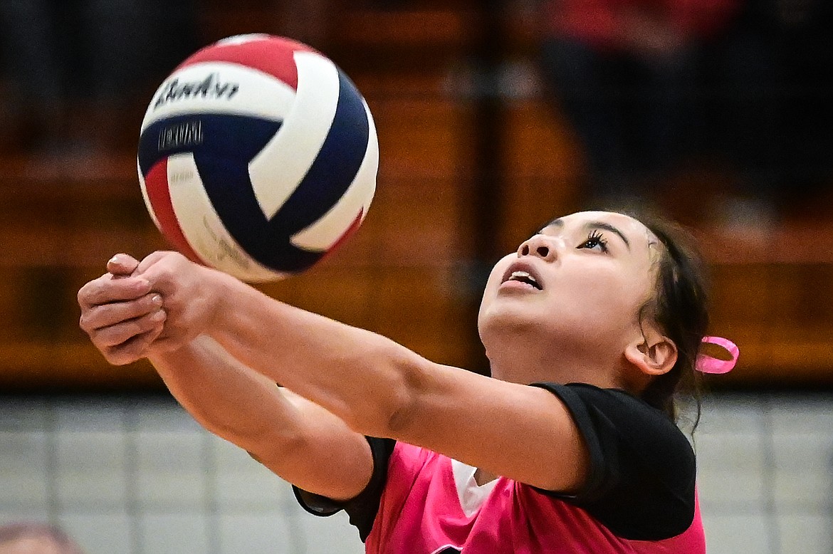 Flathead's Kylie Munsinger (4) passes to a teammate against Glacier at Flathead High School on Thursday, Oct. 14. (Casey Kreider/Daily Inter Lake)