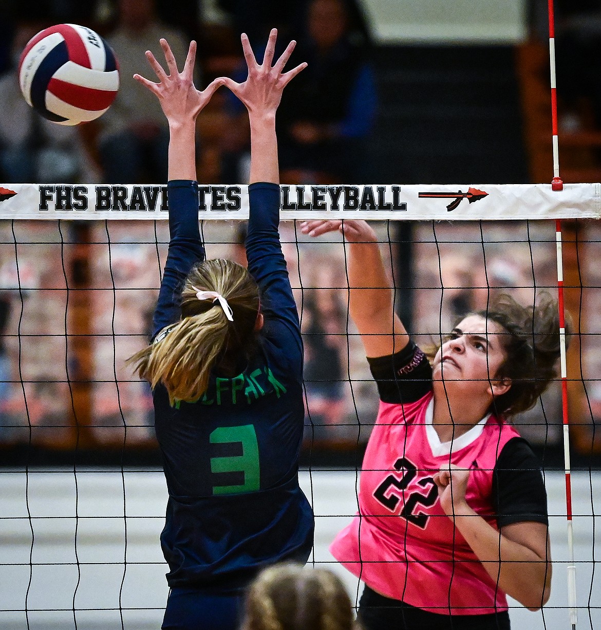 Flathead's Sienna Sterck (22) goes up for a kill against Glacier's Haven Speer (3) at Flathead High School on Thursday, Oct. 14. (Casey Kreider/Daily Inter Lake)