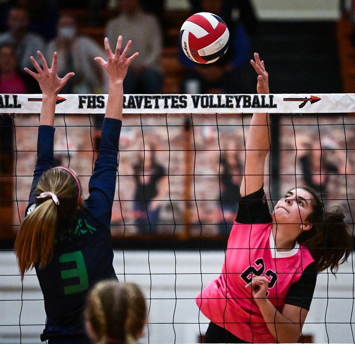 Flathead's Sienna Sterck (22) goes up for a kill against Glacier's Haven Speer (3) at Flathead High School on Thursday, Oct. 14. (Casey Kreider/Daily Inter Lake)