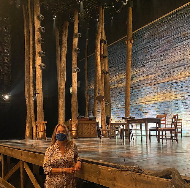 Laura Little, co-producer of "Come From Away," a musical that tells the story of 7,000 people stranded in the small town of Gander, Newfoundland after all flights into the U.S. were grounded following the 9/11 attacks, stands in front of the stage for the reopening on Broadway on Sept. 21 after COVID-19 closed down theaters. Photo courtesy of Laura Little