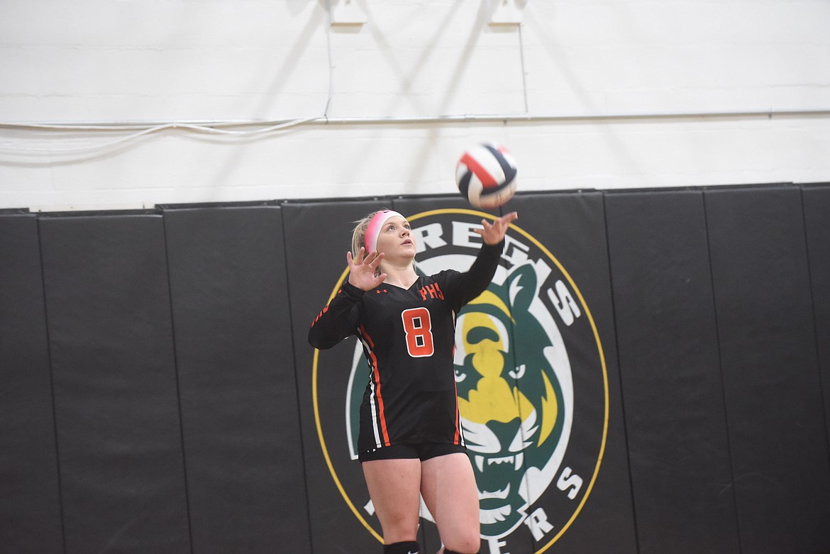 Plains Trotters player Izzy Butcher serves against St. Regis during last Thursday’s match. (Scott Shindledecker/Valley Press)