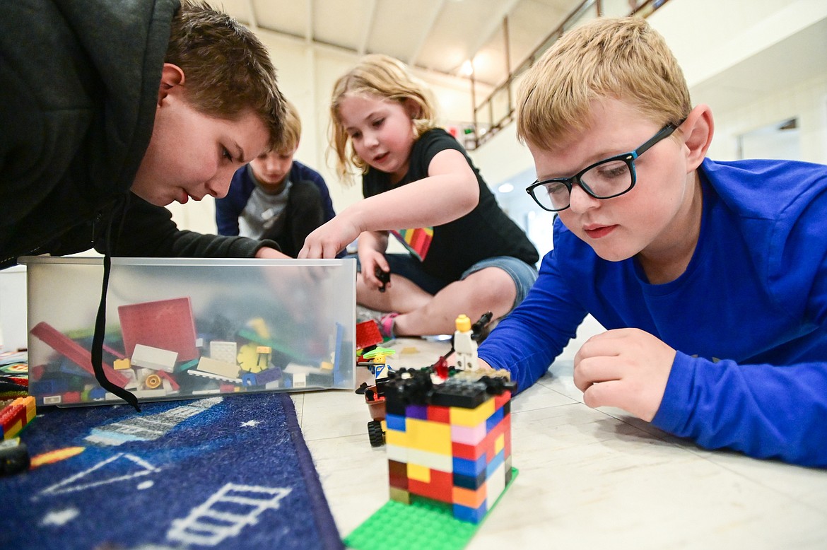 Kids play with Legos at the Boys & Girls Clubs of Glacier Country Evergreen Clubhouse ribbon cutting event on Thursday, Oct. 14. (Casey Kreider/Daily Inter Lake)