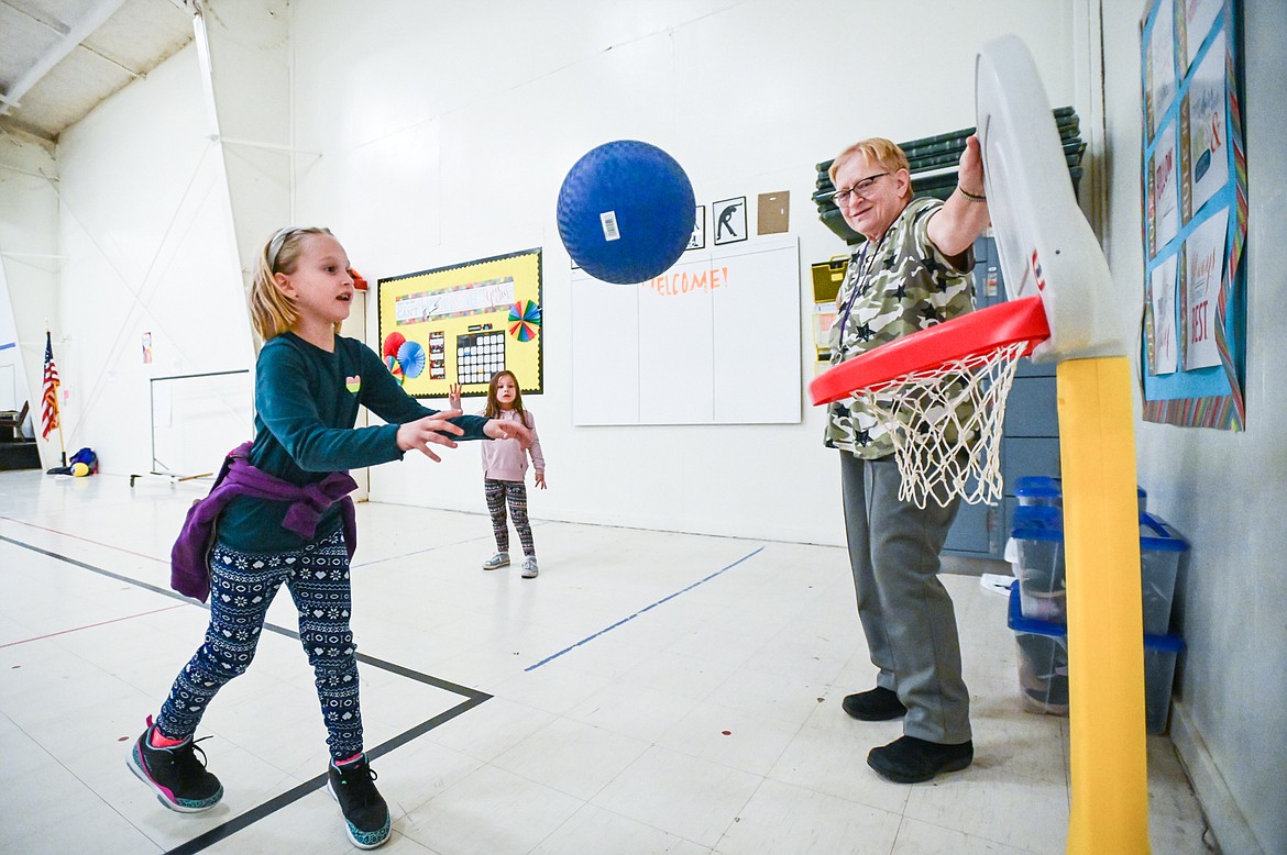 Kids shoot basketball at the Boys & Girls Clubs of Glacier Country Evergreen Clubhouse ribbon cutting event on Thursday, Oct. 14. (Casey Kreider/Daily Inter Lake)