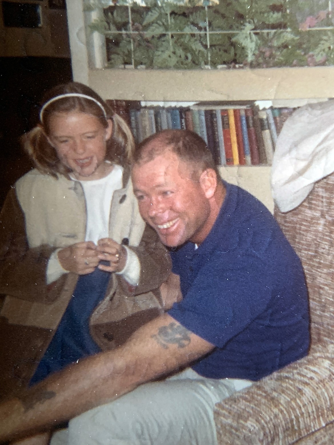 Jack Pettitt and his daughter, Sharon (Peetz) on the day he returned home from his service as a civilian during the Vietnam War where he supervised the revamping of the communications system. (photo provided)