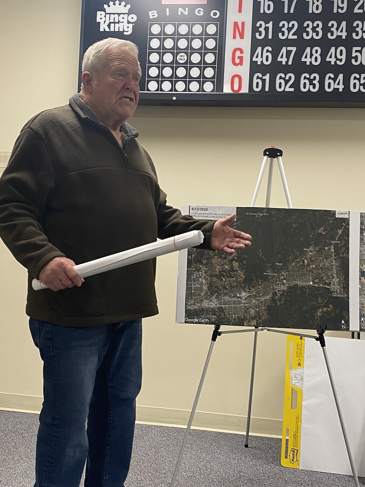 Ron McGhie, a Big Sky neighborhood resident, spoke to the crowd at the No Huetter Bypass community action group Thursday night. McGhie lived in Los Angeles for 30 years, working for the LA Department of Water and Power. He presented maps showing different options the city could utilize other than constructing the Huetter Corridor.