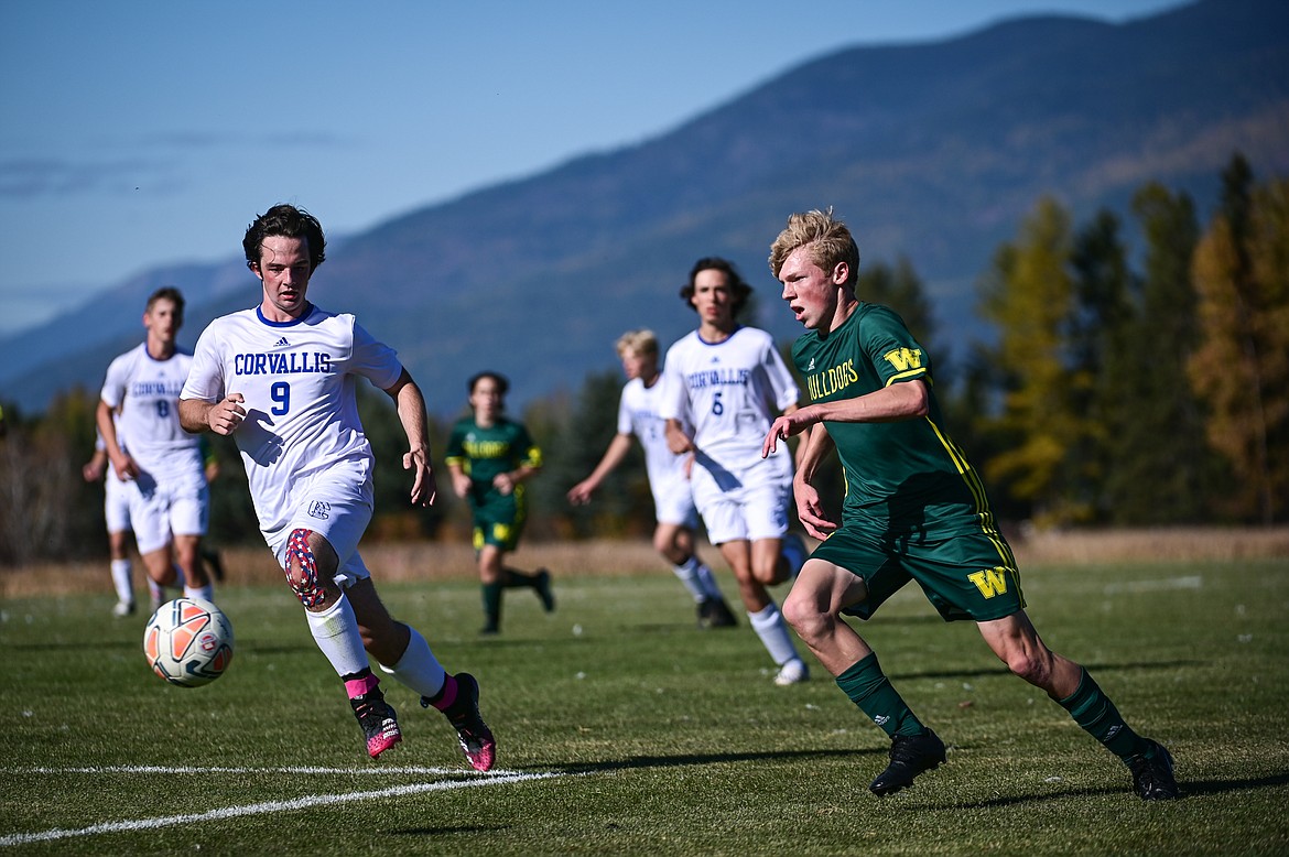 Whitefish's Jackson Dorvall (10) attacks the Corvallis defense in the first half at Smith Fields on Saturday, Oct. 16. (Casey Kreider/Daily Inter Lake)