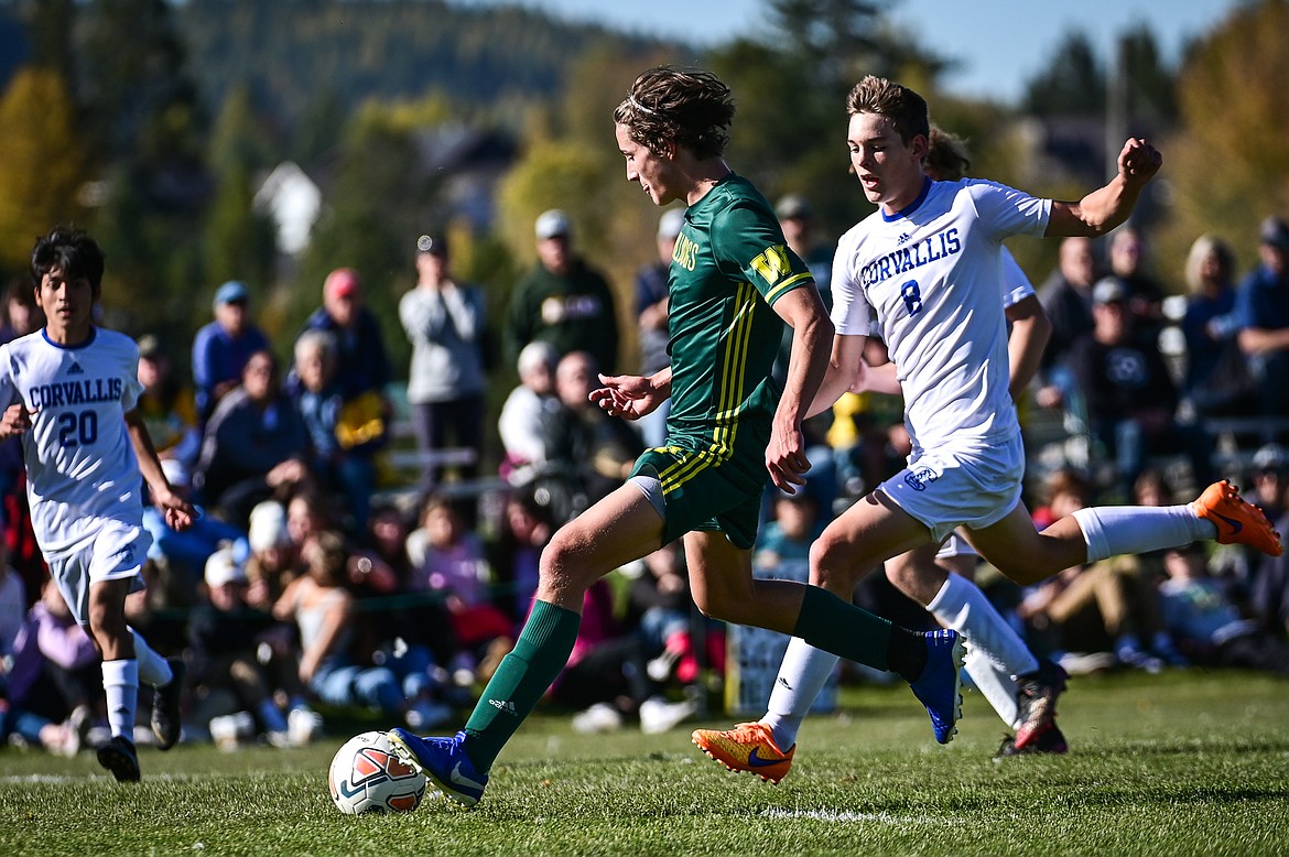 Whitefish's Gabe Menicke (9) scores a goal in the first half against Corvallis at Smith Fields on Saturday, Oct. 16. (Casey Kreider/Daily Inter Lake)