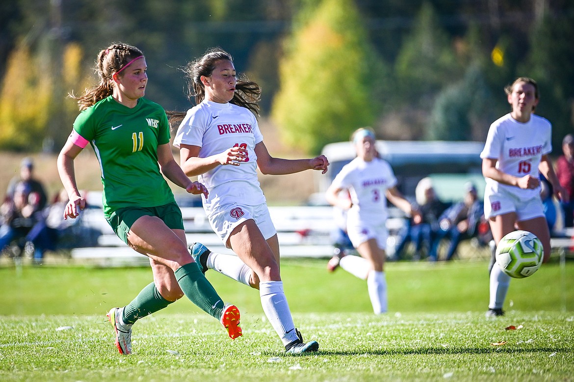 Whitefish's Emma Barron (11) scores a goal in the first half against Loyola Sacred Heart at Smith Fields on Saturday, Oct. 16. (Casey Kreider/Daily Inter Lake)