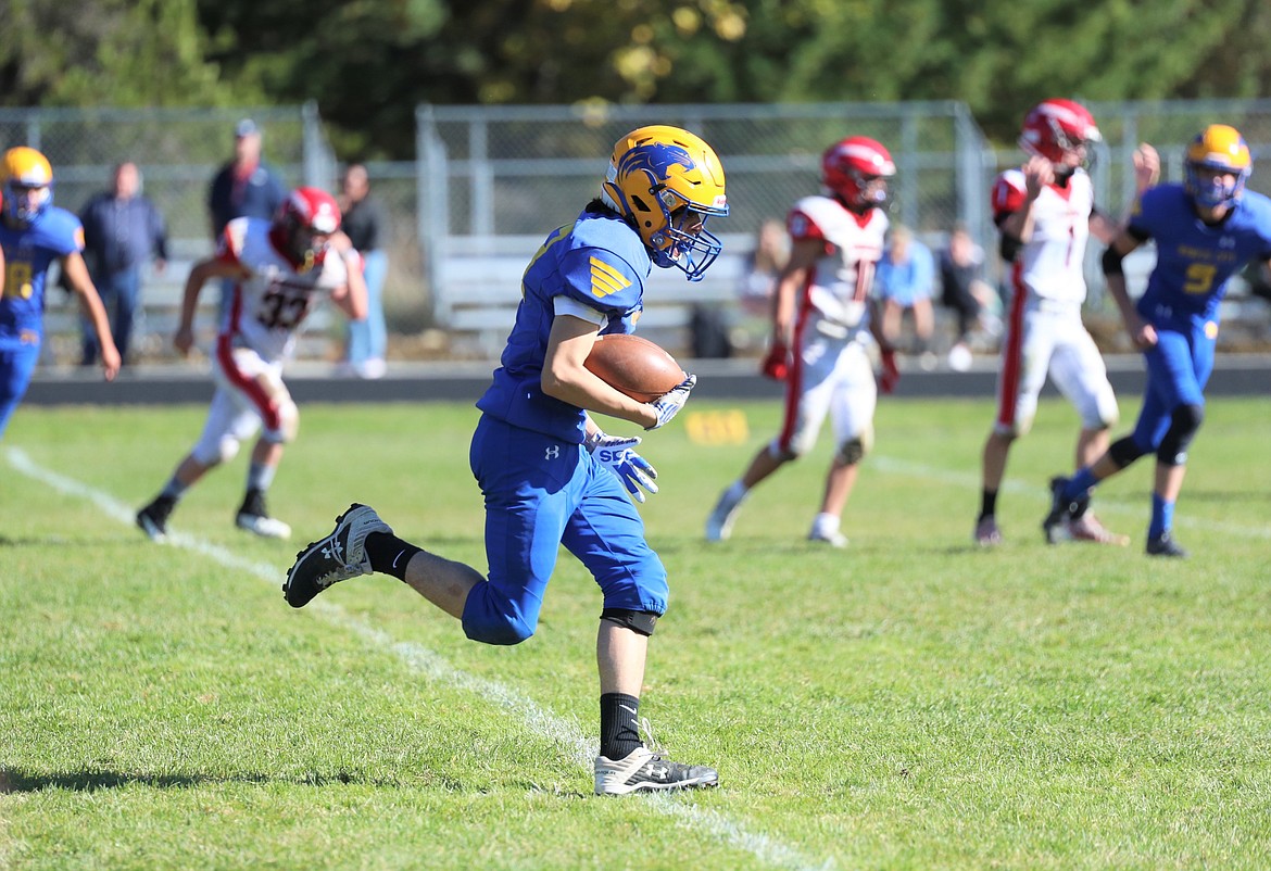 Cole Sanroman returns an interception 71 yards for a touchdown on Saturday.