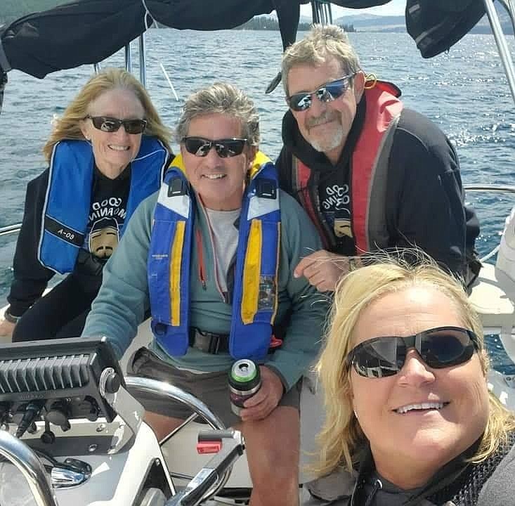 One of the best parts of owning their own sailboat is taking their good friends out for a sail. From left, are Mary Jo Lommen, David Asay at the helm, Jim Lommen and Liz Asay, who snapped a photo of the crew. (Photos courtesy David Asay)