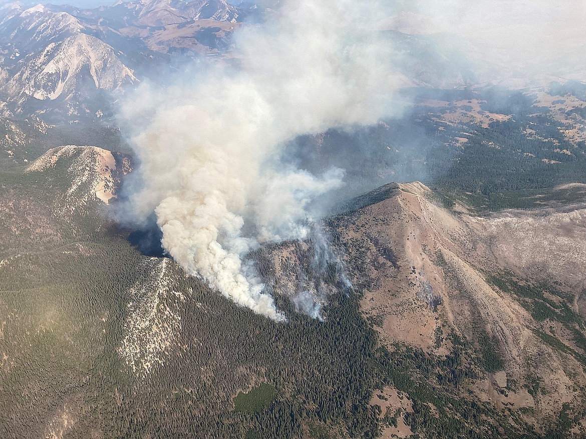 The Crown Mountain Fire burns west of Augusta on the Rocky Mountain Front Oct. 5. The fire as well as several other human-caused fire starts, has the Rocky Mountain Ranger District going to Stage 1 Fire Restrictions. (Forest Service photo)