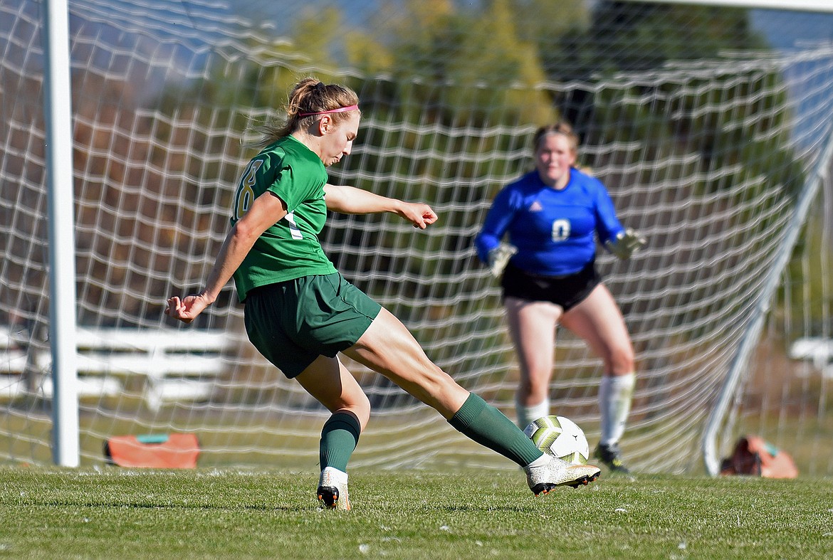 Whitefish's Maeve Ingelfinger nails a goal past Loyola's keeper in the Lady Bulldog's playoff win on Saturday at Smith Fields. (Whitney England/Whitefish Pilot)