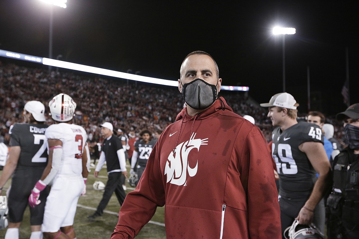 YOUNG KWAK/Associated Press
Washington State football coach Nick Rolovich walks on the field after the Cougars' win over Stanford on Saturday at Martin Stadium in Pullman.