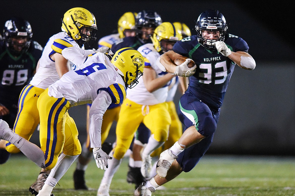 Glacier running back Jake Rendina (33) breaks loose on a 42-yard run in the third quarter against Missoula Big Sky at Legends Stadium on Friday. (Casey Kreider/Daily Inter Lake)