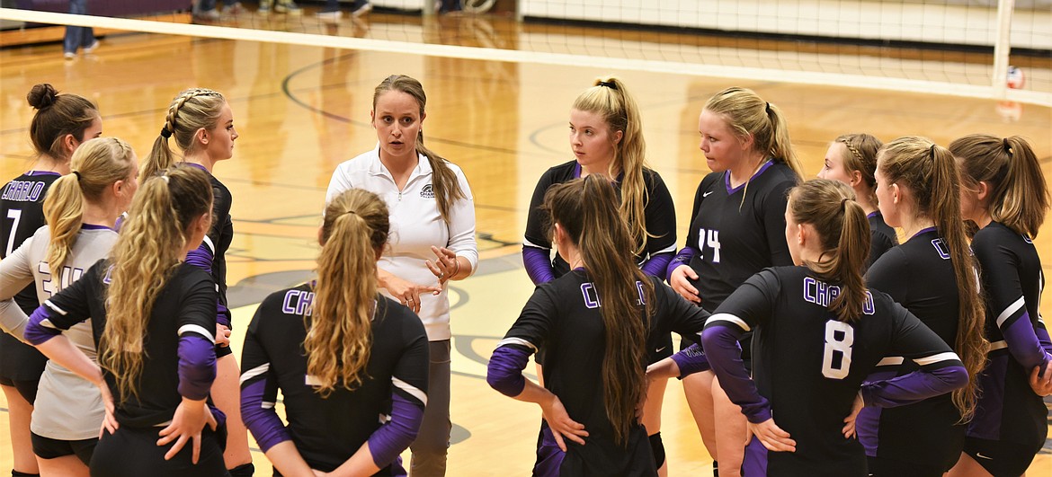 Charlo head coach Rhondell Volinkaty talks with her players during a break in action. (Scot Heisel/Lake County Leader)