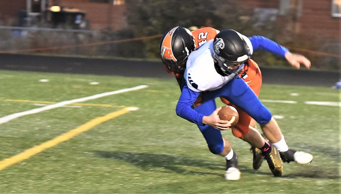 The Chiefs' Tristan Fisher sacks Corvallis quarterback Chase Tucker during the first quarter Friday in Ronan. (Scot Heisel/Lake County Leader)