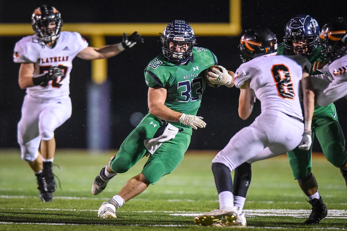 Glacier running back Jake Rendina (33) takes off on a 34-yard touchdown reception in the second quarter against Flathead  during crosstown football at Legends Stadium on Friday. (Casey Kreider/Daily Inter Lake)