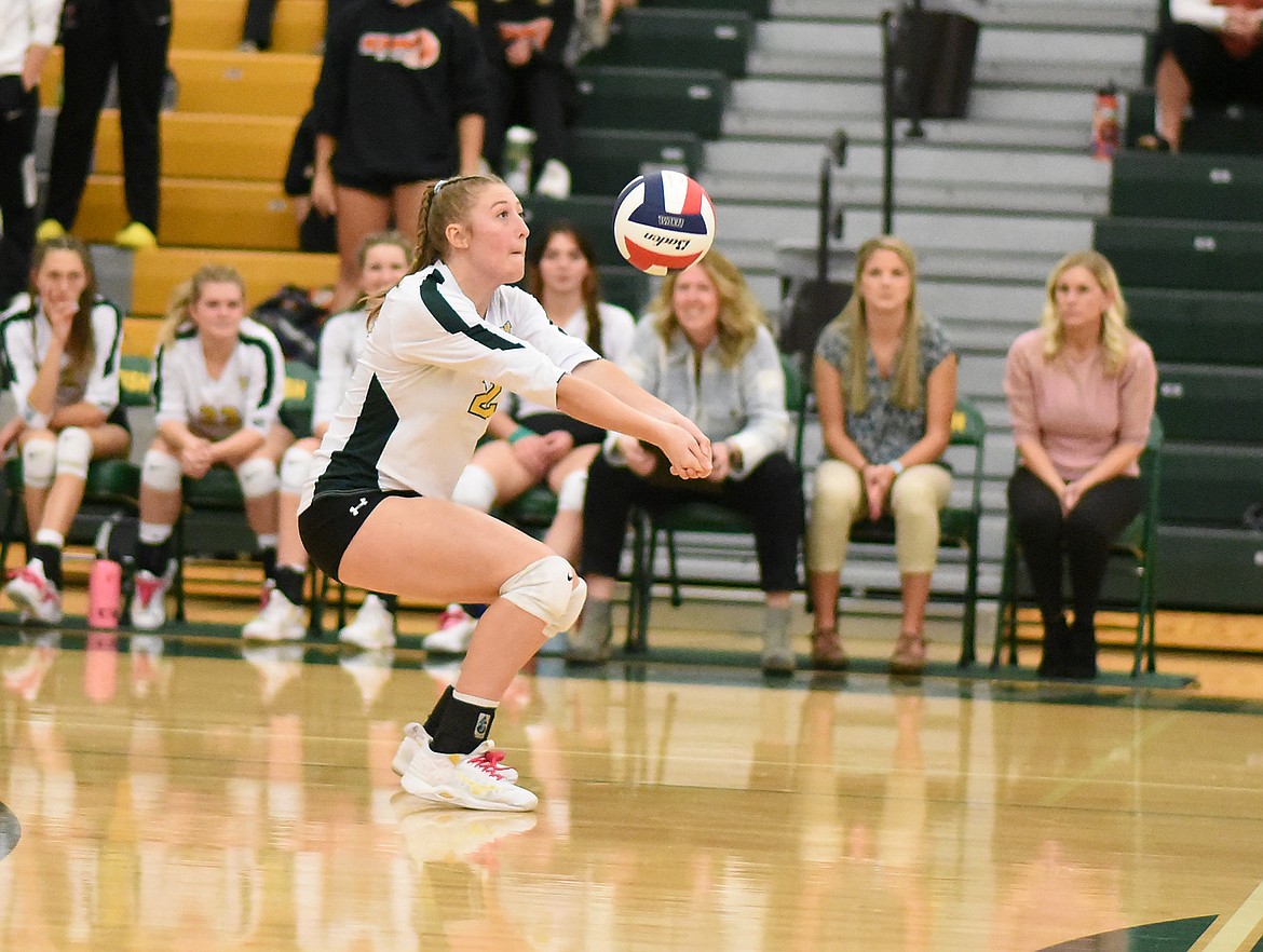 Bulldog Erin Wilde bumps the ball against Ronan last week at home. (Whitney England/Whitefish Pilot)