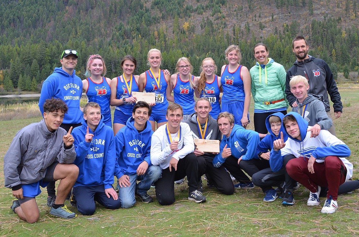 Both the Vikings and Valkyries cross country teams earned divisional titles at Thompson Falls Wednesday. Pictured in the back row are Jimmy Steyee, Makenna Keller, Tabitha Raymond, Mahali Kuzyk, Claire Jensen, Erica Dowling, Lily Peterson, coach Sam Modderman and head coach Ryan Nollan. In the front row are Colten Wroble, Sam Ayers, Sean Cotman, Ryder Nollan, Elliot Sanford, North Nollan, Colton Ballard, Bo Modderman and Jack Jensen. (photo provided)