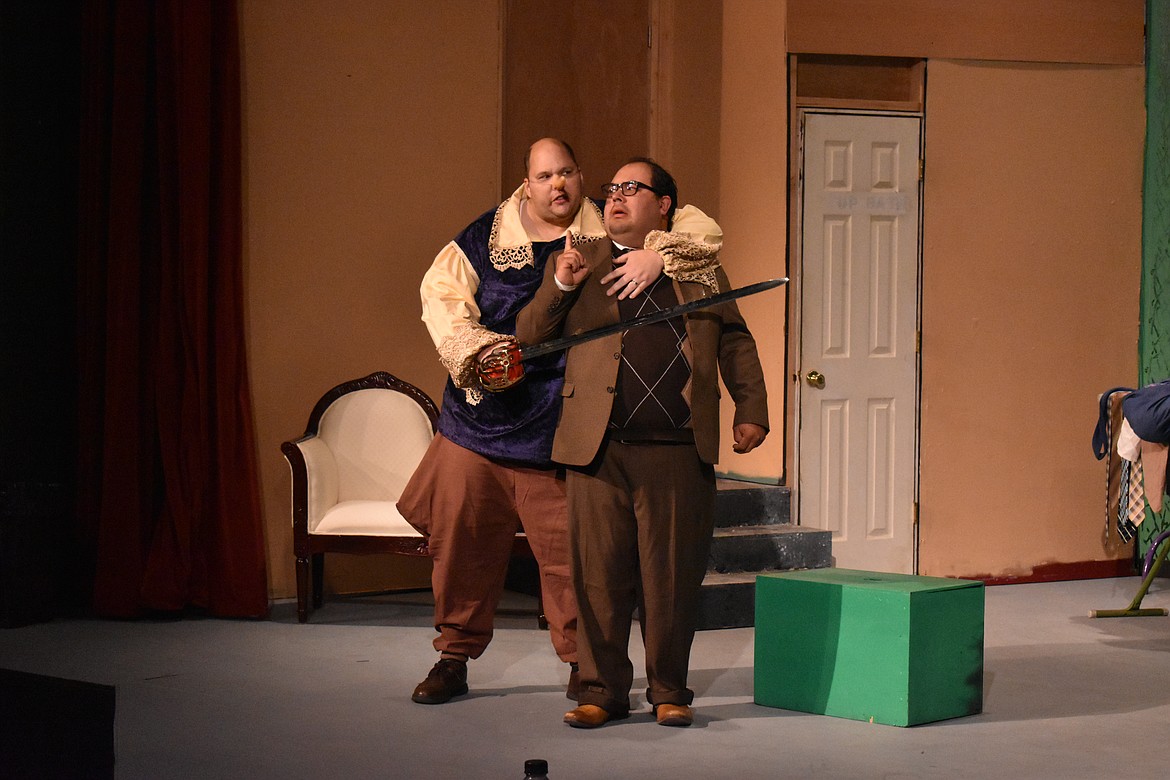 Christopher Longstreet holds a fake sword to Jesse Huntwork during dress rehearsals on Oct. 14.