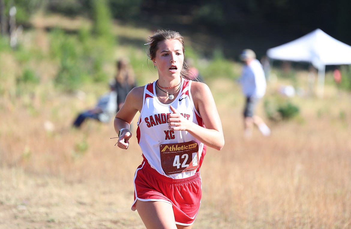 Senior Megan Oulman competes in the Pine Street Woods Invitational on Aug. 27.