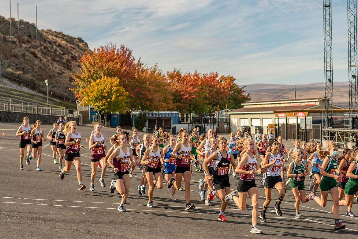 Varsity cross-country girls start at the Gorge Amphitheatre Saturday.