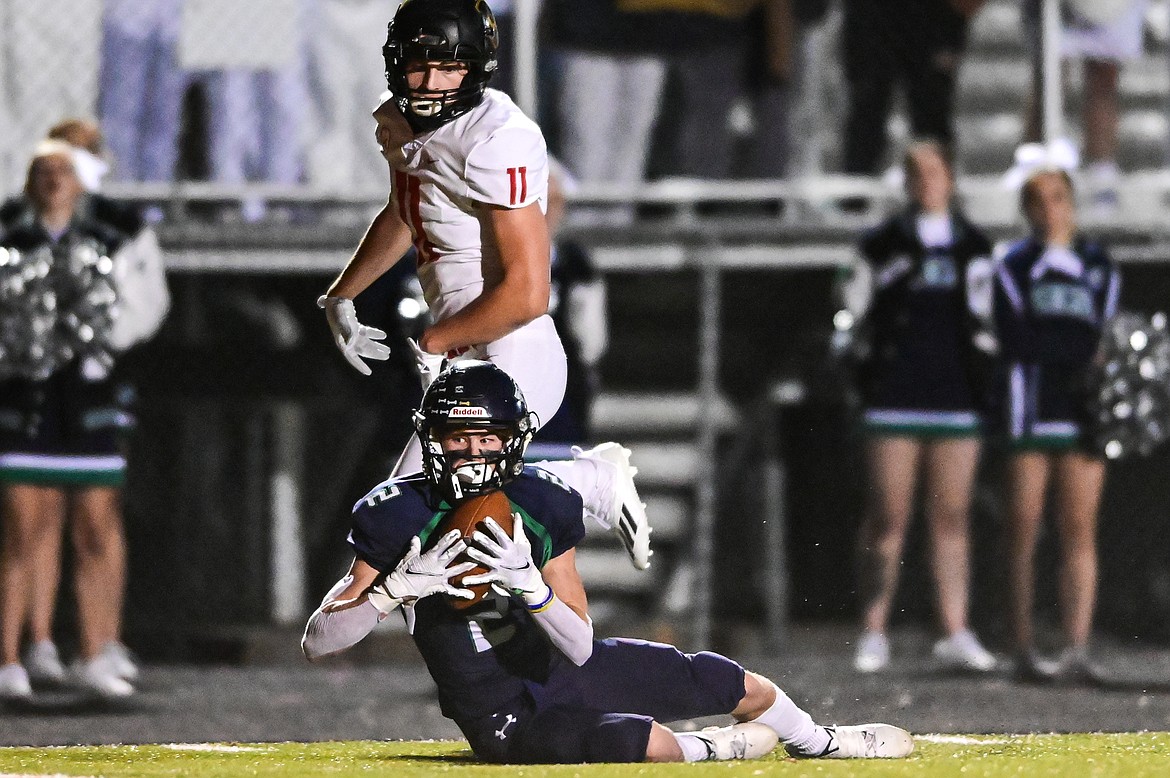 Glacier wide receiver Connor Sullivan (2) holds on to a reception in the first quarter against Missoula Hellgate at Legends Stadium on Thursday, Oct. 21. (Casey Kreider/Daily Inter Lake)
