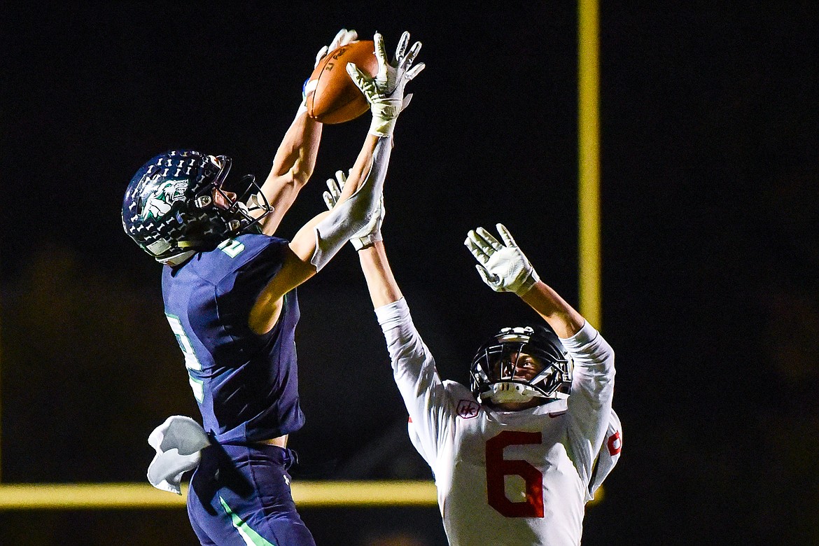 Glacier wide receiver Connor Sullivan (2) holds on to a reception in the third quarter against Missoula Hellgate at Legends Stadium on Thursday, Oct. 21. (Casey Kreider/Daily Inter Lake)