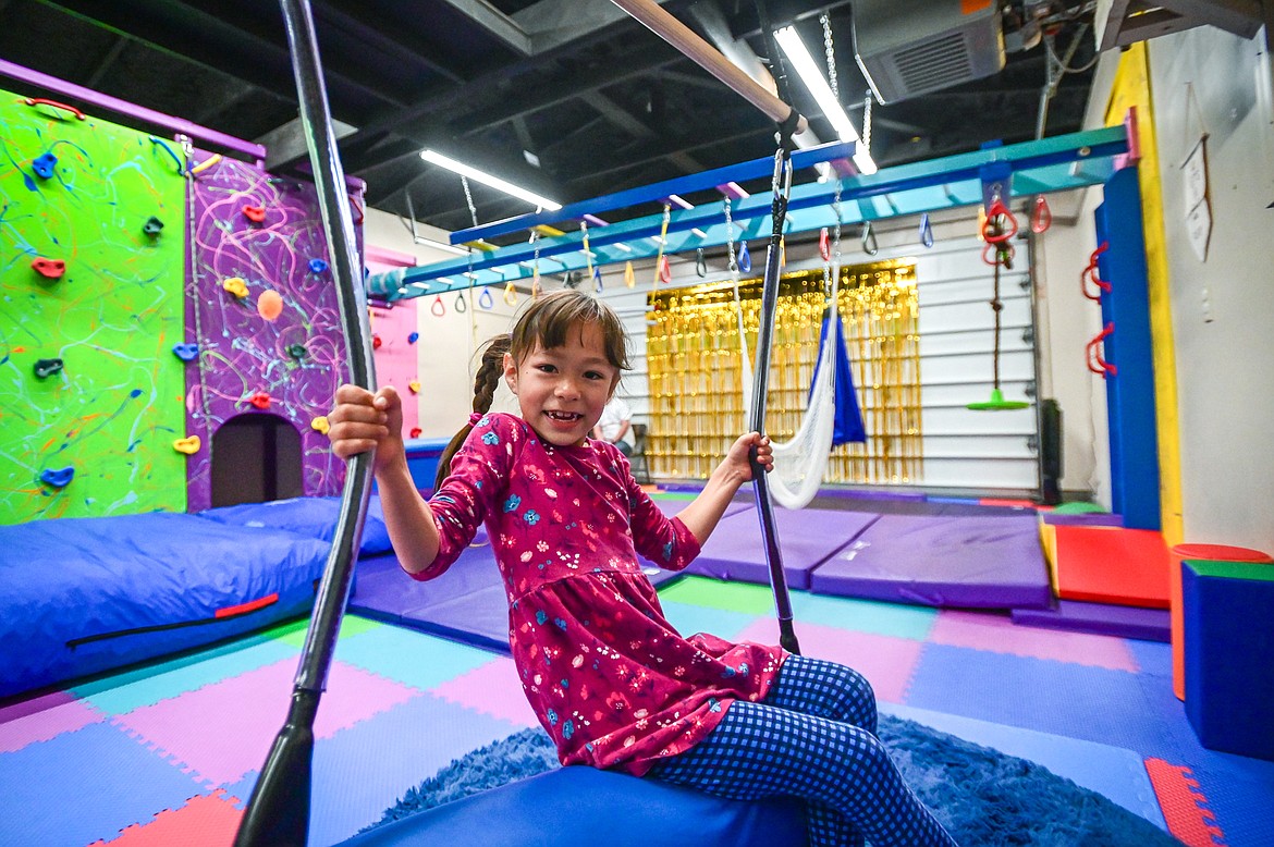 A child plays on one of the swings at Rylee's Play Place in Kalispell on Thursday, Oct. 21. (Casey Kreider/Daily Inter Lake)