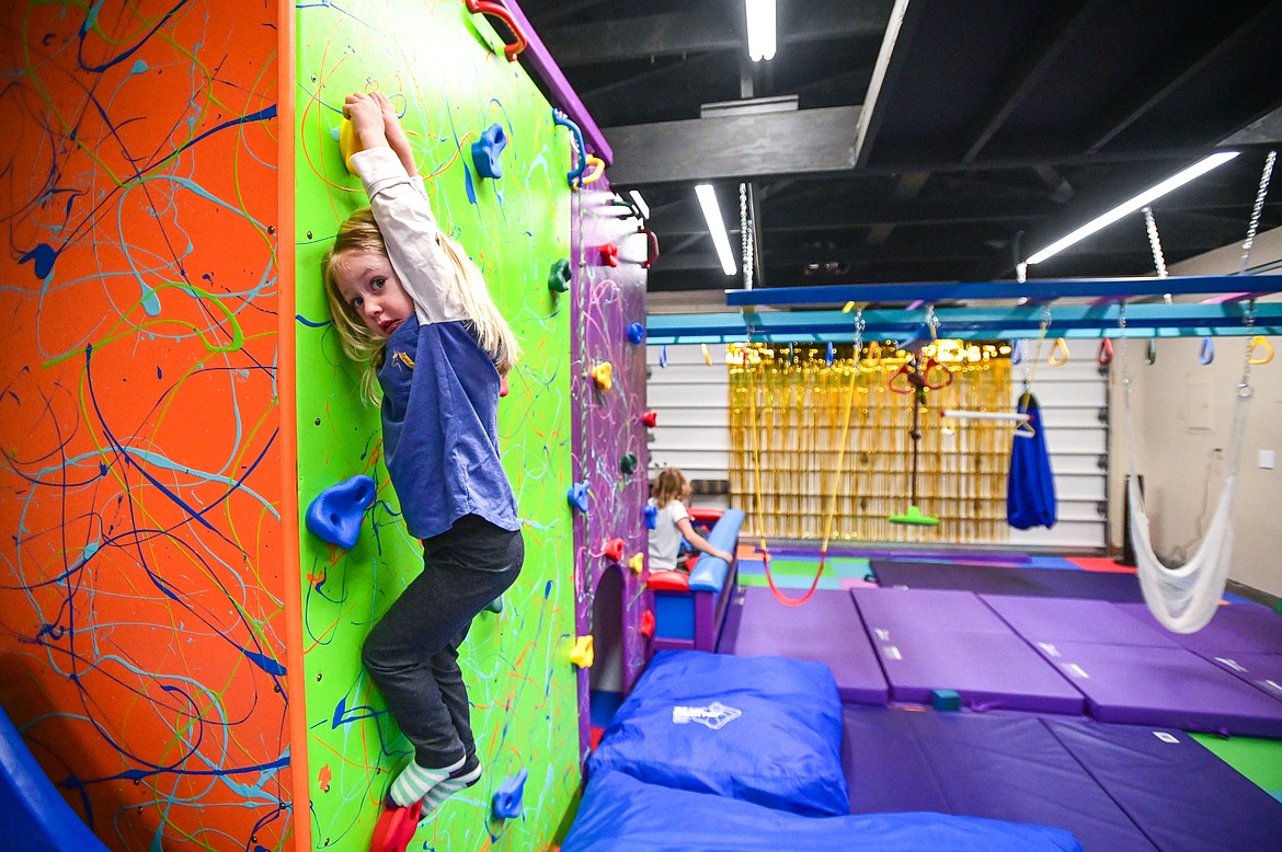 A child navigates one of the mini climbing walls at Rylee's Play Place in Kalispell on Thursday, Oct. 21. (Casey Kreider/Daily Inter Lake)