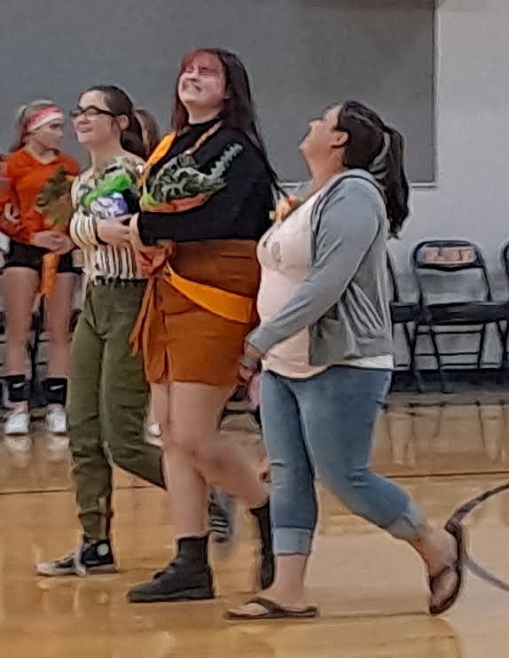 Plains volleyball manager Krystena Boes was escorted by her aunt Parisah Burris and sister KayLynn Boes during Senior Night festivities last Thursday. (Adam Lindsay/Valley Press)