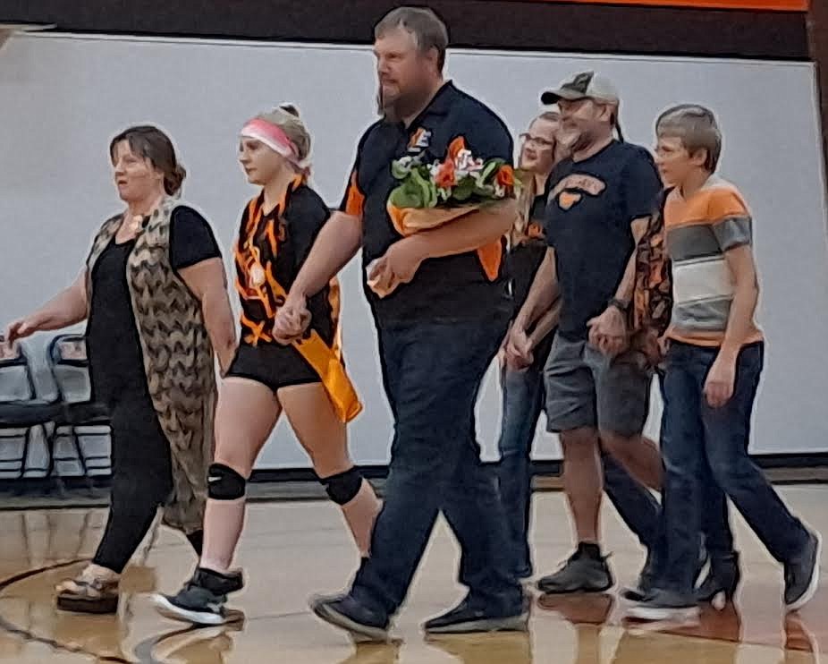 Plains volleyball player Izzy Butcher was escorted by parents Zach and Jesse Butcher, brother Wyatt Butcher, sister Aubree Butcher, Papa Jay Garrison and Grandma Teresa Garrison during Senior Night festivities last Thursday. (Adam Lindsay/Valley Press)