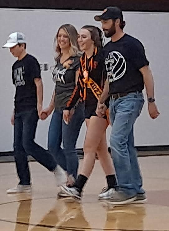 Plains volleyball player Lexa Craft was escorted by her parents Kasey and Cassie Craft and her brother Kort during Senior Night festivities last Thursday. (Adam Lindsay/Valley Press)