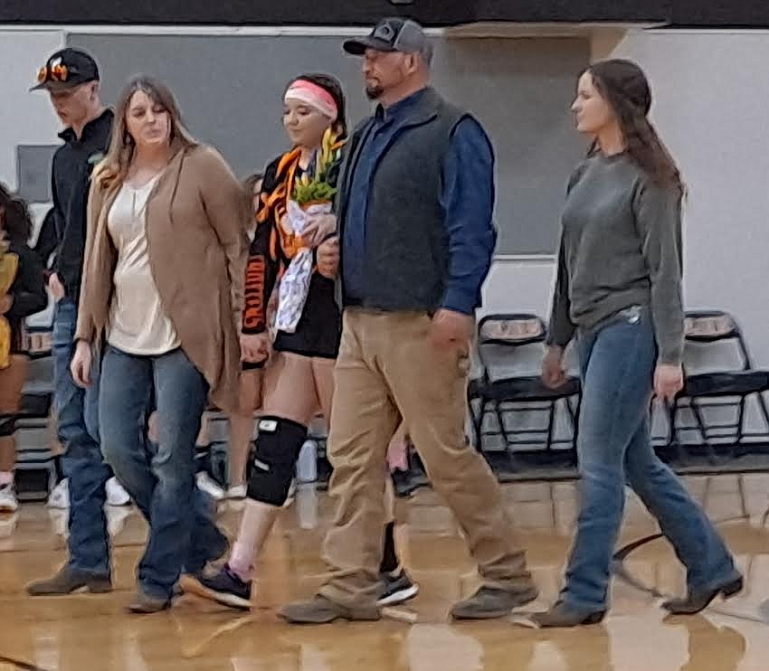 Plains volleyball player Madison Elliot was escorted by her parents Catharine and Eric Elliott, sister MacKenzie Elliot and brother Mason Elliott during Senior Night festivities last Thursday. (Adam Lindsay/Valley Press)