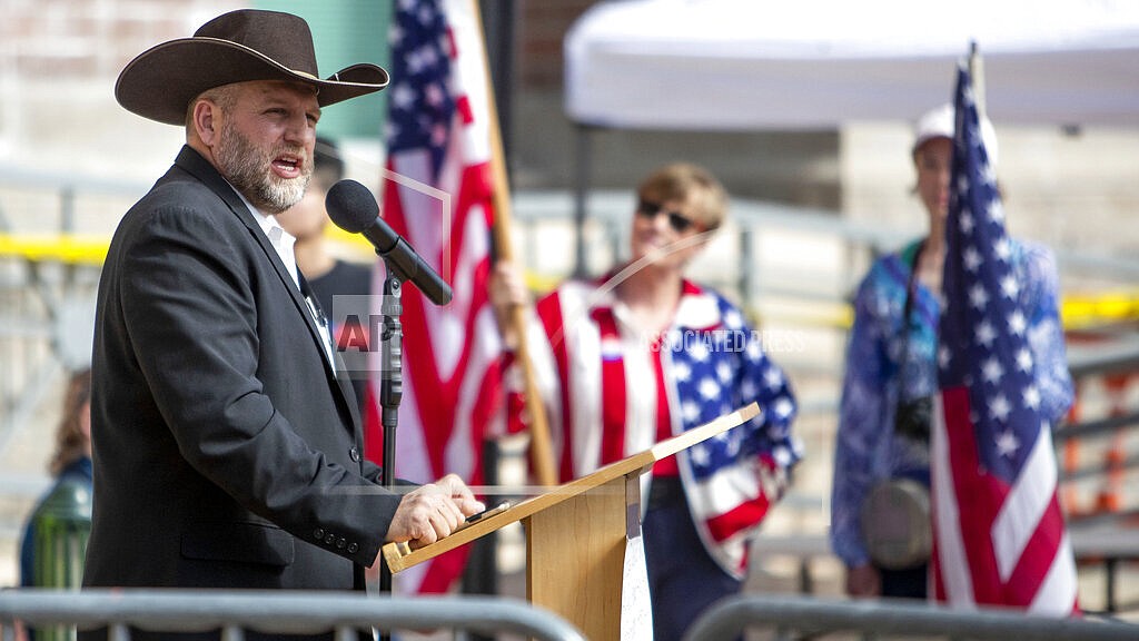 In this April 3, 2021, file photo, Ammon Bundy speaks to a crowd of about 50 followers in front of the Ada County Courthouse in downtown Boise. A far-right group launched the anti-government activist Bundy is rapidly expanding nationwide and making inroads into Canada, according to a new report from the Institute for Research and Education on Human Rights. (Darin Oswald/Idaho Statesman via AP, File)