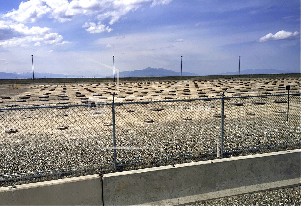 In this May 11, 2015, file photo, nuclear waste is stored in underground containers at the Idaho National Laboratory near Idaho Falls, Idaho. U.S. officials say problems plaguing a nuclear waste treatment plant in eastern Idaho appear to be solved, and converting high-level liquid waste into a safer and more easily managed solid material could start early next year. Joel Case of the U.S. Department of Energy said Thursday, Oct. 21, 2021, that a test startup without waste will begin next week at the Integrated Waste Treatment Unit at the Energy Department's 890-square-mile site that includes the Idaho National Laboratory. (AP Photo/Keith Ridler, File)