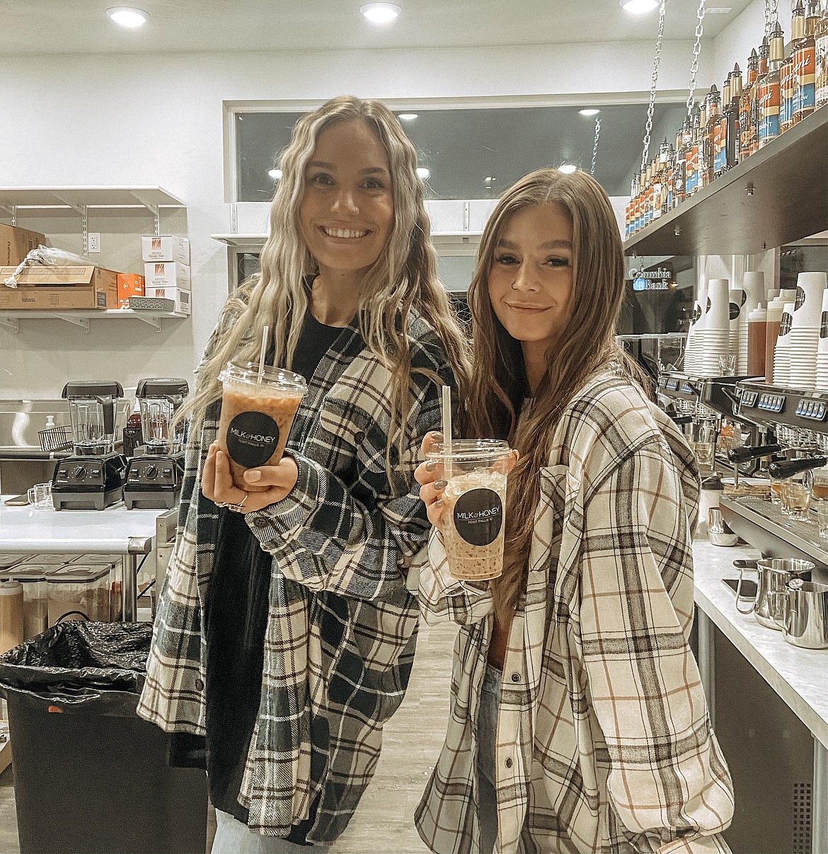 Milk & Honey Coffee baristas Tessa Sarff, left, and Peyton Kronenberg.