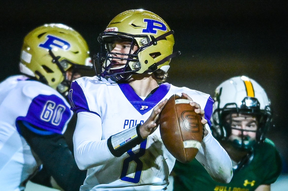 Polson quarterback Jarrett Wilson (8) looks to pass in the first quarter against Whitefish at Memorial Field in Whitefish on Friday, Oct. 22. (Casey Kreider/Daily Inter Lake)