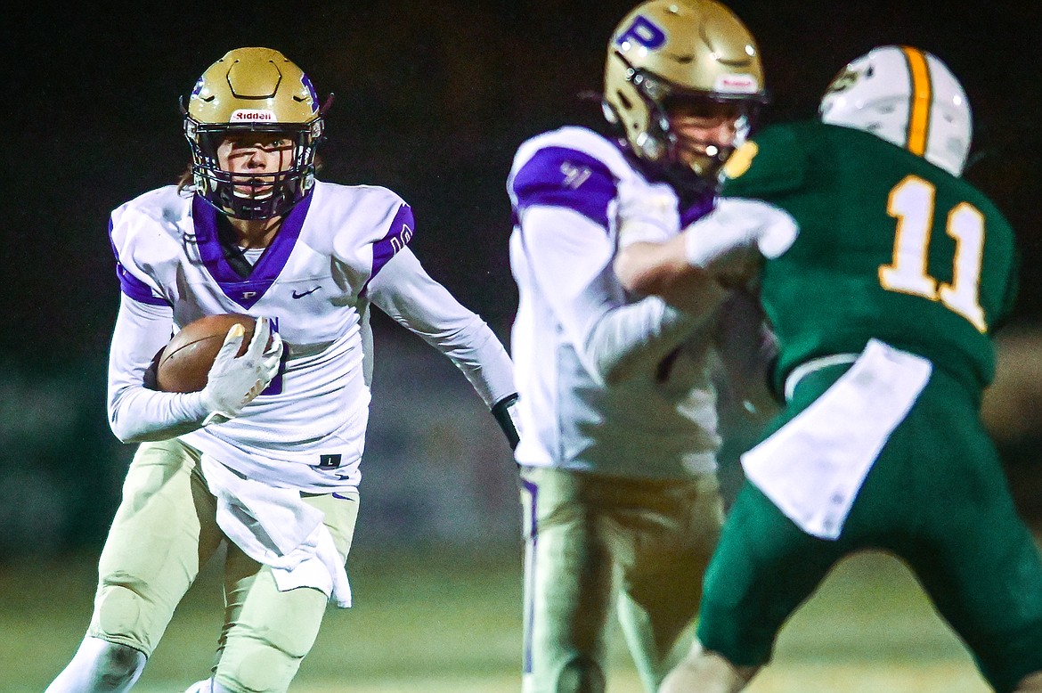 Polson wide receiver Colton Graham (10) looks upfield after a reception in the second quarter against Whitefish at Memorial Field in Whitefish on Friday, Oct. 22. (Casey Kreider/Daily Inter Lake)