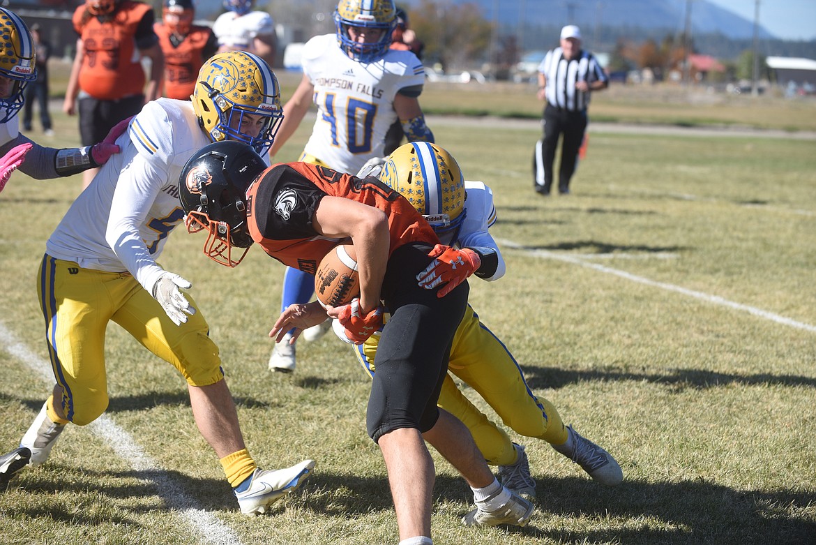 Thompson Falls senior Nathan Schraeder helped make a tackle against Plains during a game Oct. 16. Last Thursday against Troy, Schraeder scored a touchdown and added four extra point kicks. (Scott Shindledecker/Valley Press file)