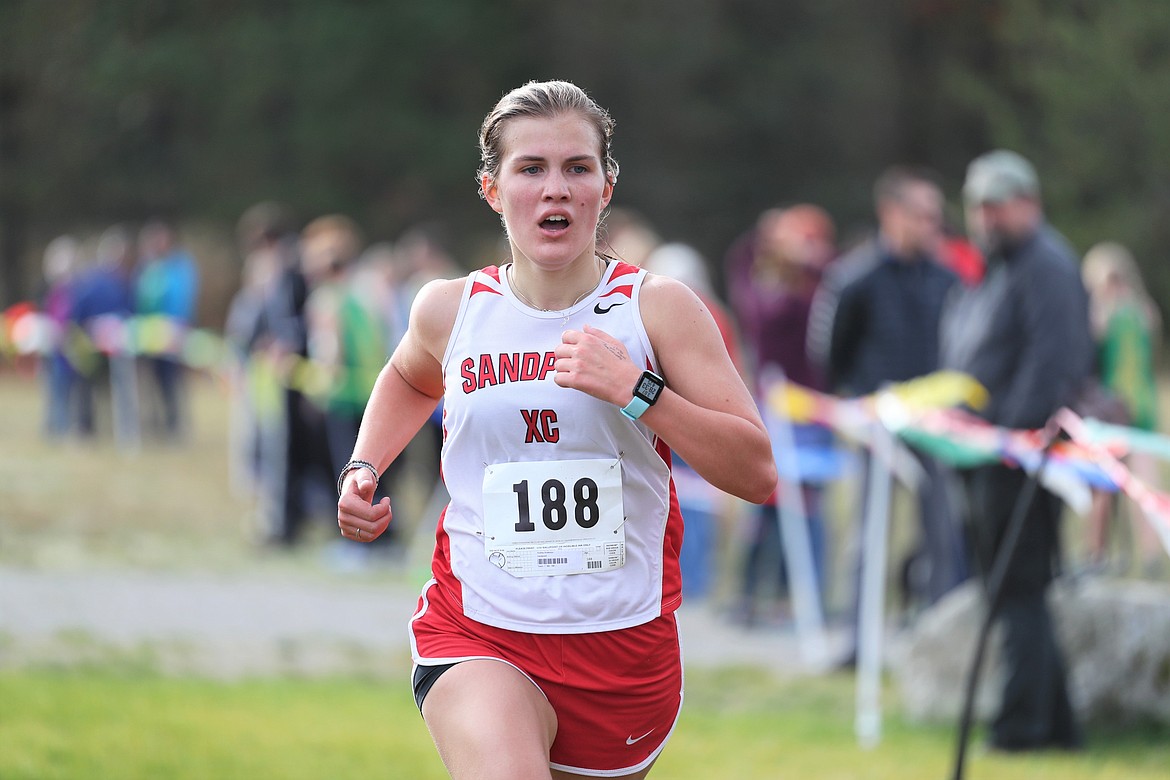 Audrey Anderson crosses the finish of Thursday's regional race.